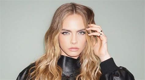 Cara Delevingne advertises a face mist made from .